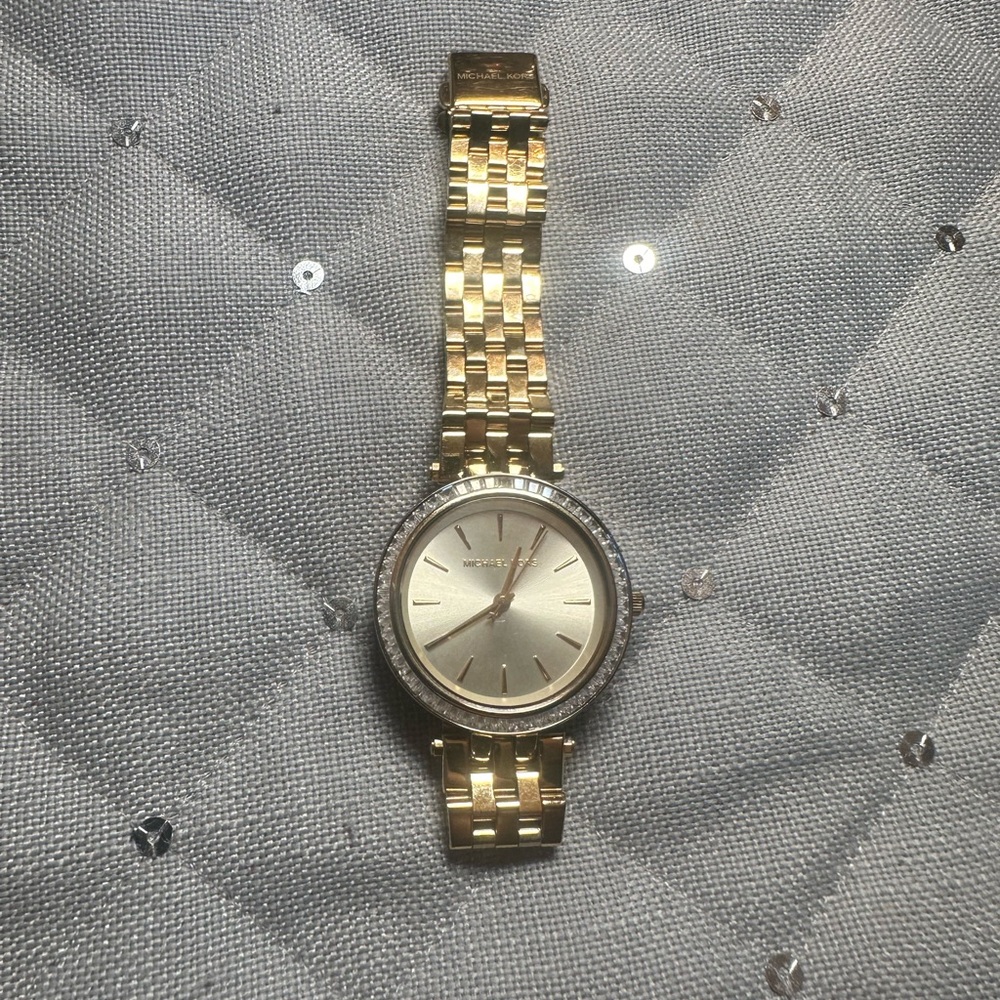 Women’s gold Michae kors watch